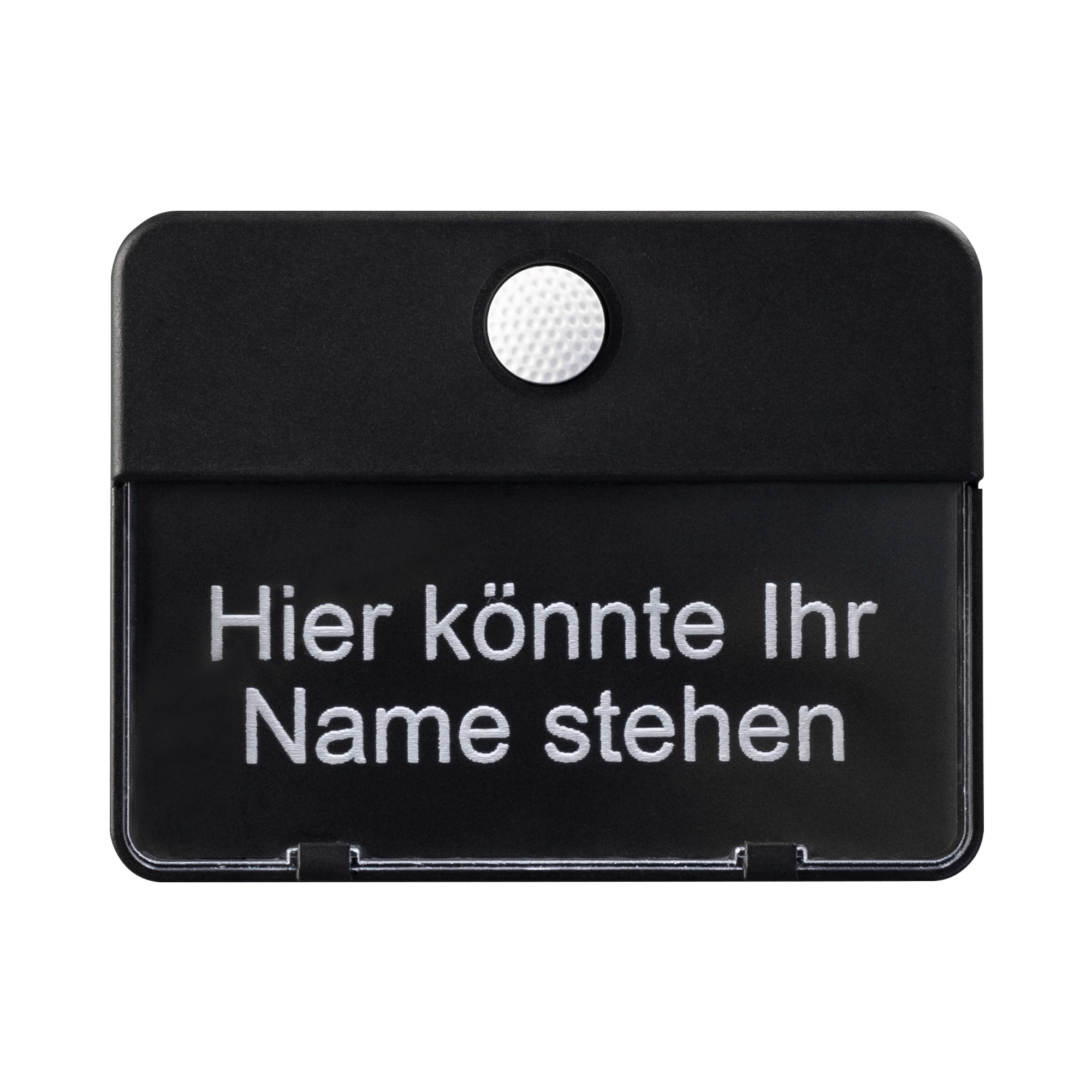 Schwarze Klingelplatte mit weißer Taste oben und gravierter Beschriftung "Hier könnte Ihr Name stehen", frontal fotografiert.