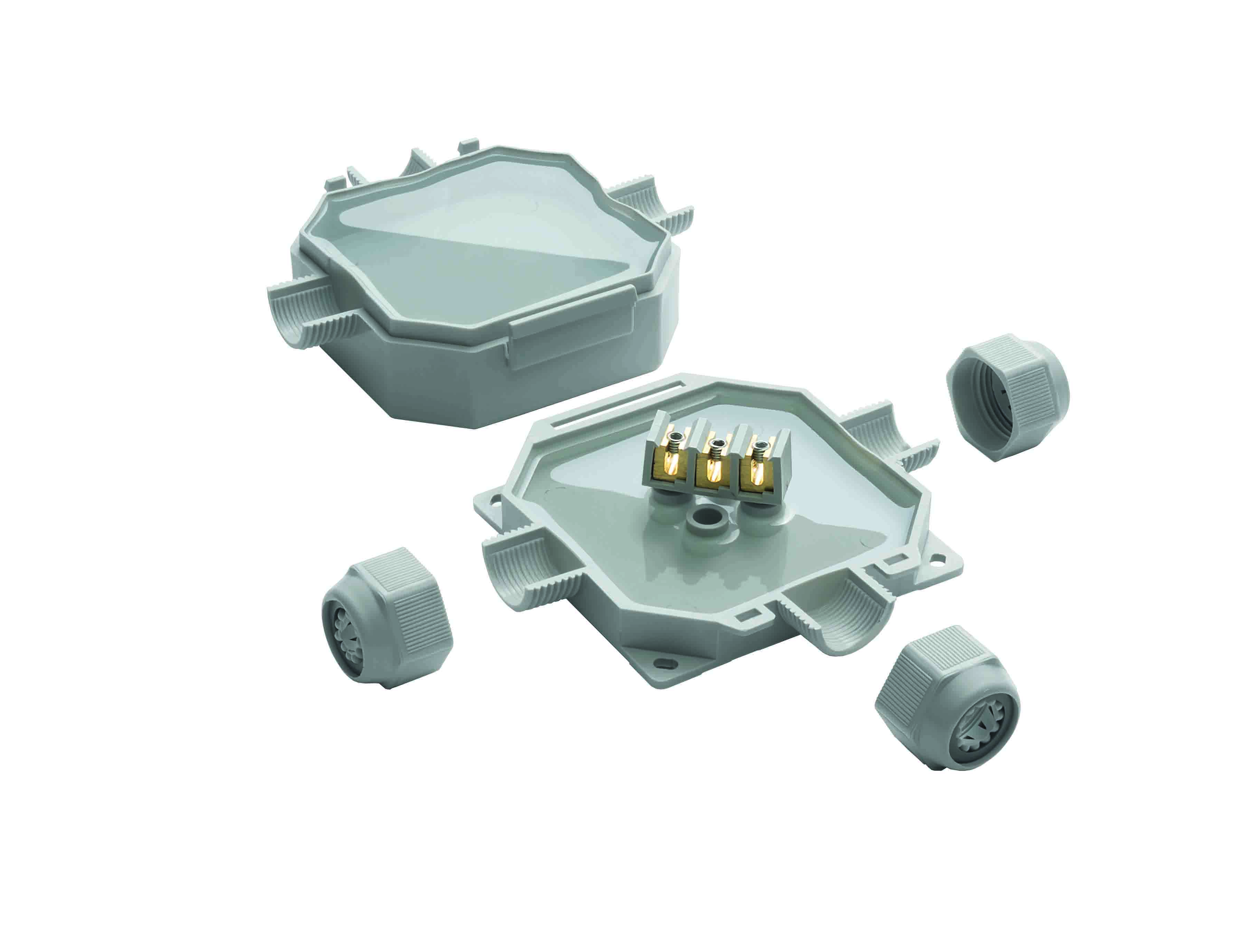 Unter- und Oberseite der grauen Verteilerdose mit Gel gefüllt