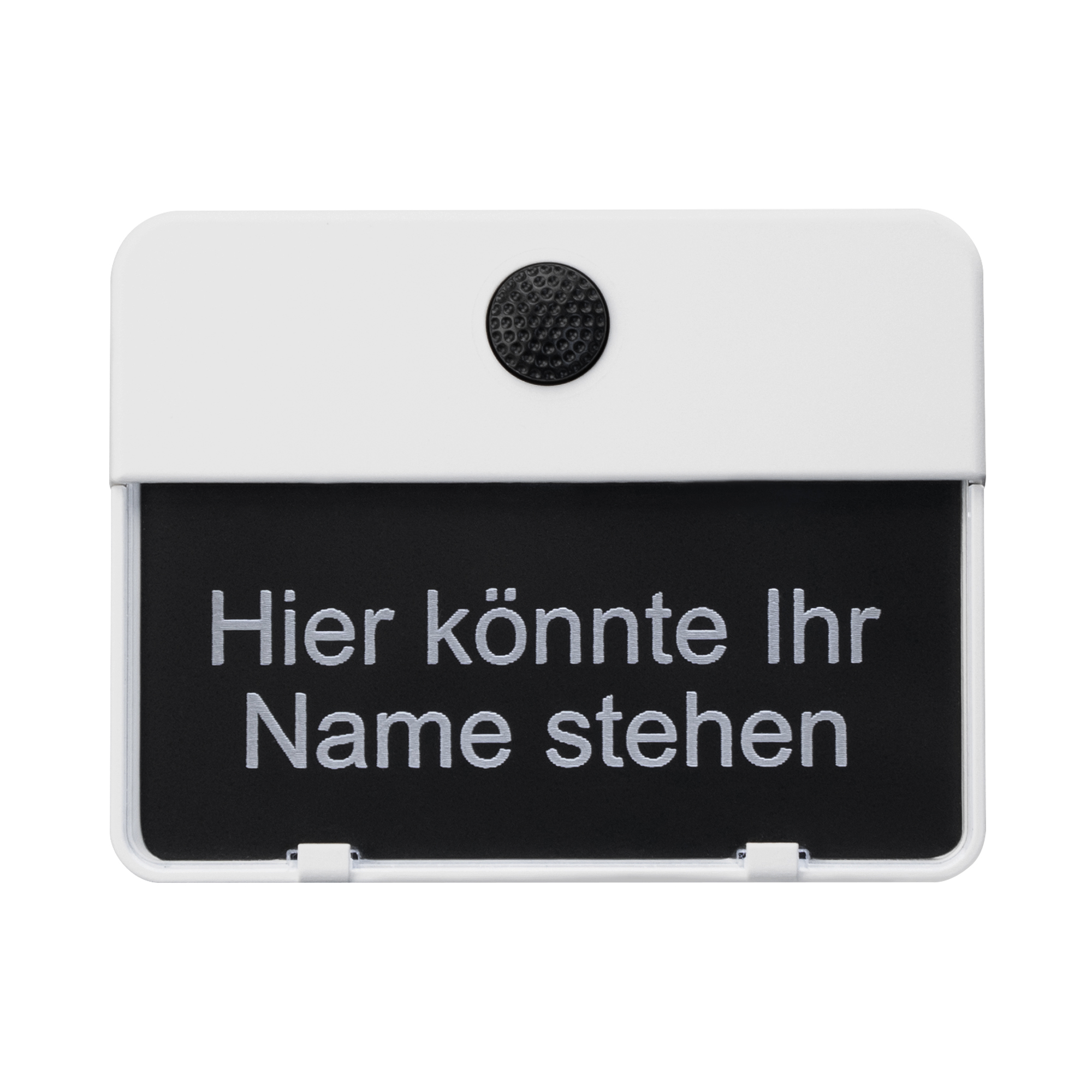 Weiße Klingelplatte mit schwarzer Taste oben und gravierter Beschriftung "Hier könnte Ihr Name stehen", frontal fotografiert.