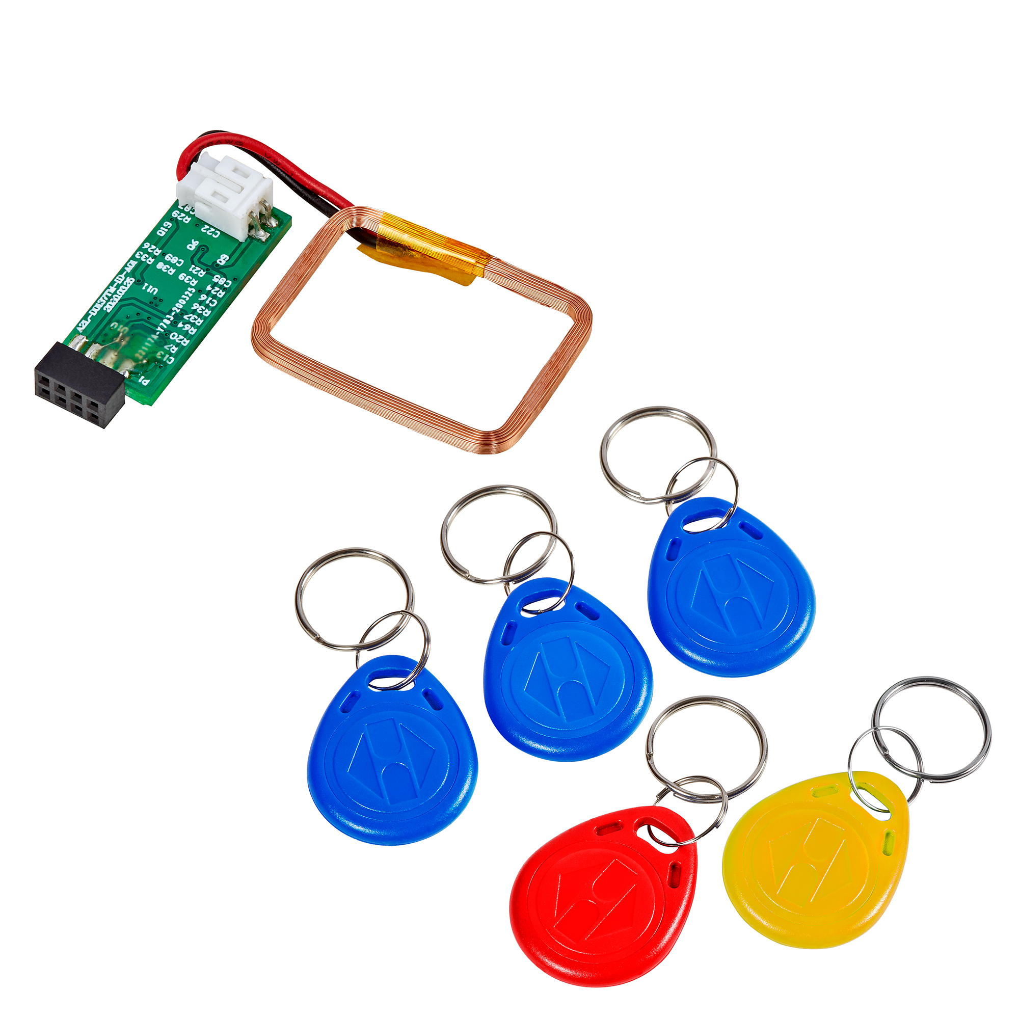 Zutrittskontroll-Set mit RFID-Lesemodul und sechs farbigen Transpondern in Blau, Gelb und Rot, Draufsicht.