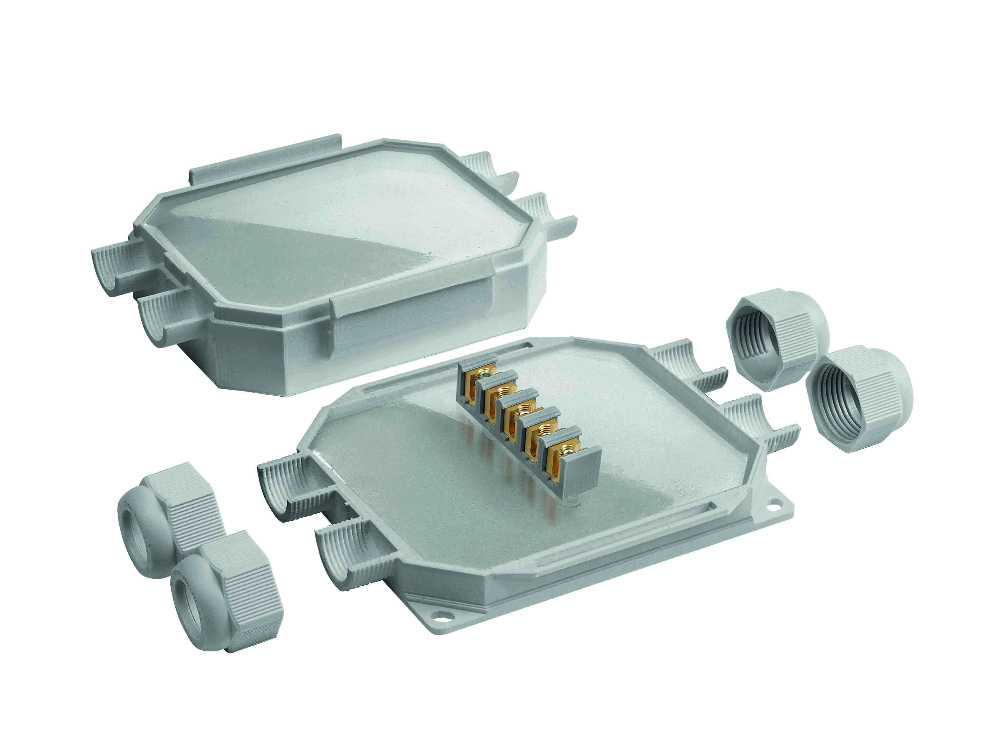 Unter- und Oberseite der grauen Verteilerdose mit Gel gefüllt