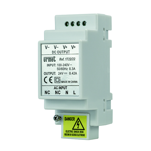 Weißes Hutschienen-Netzteil von Urmet, Eingang 100–240V, Ausgang 24V DC, 0,42A, mit Warnhinweis „Danger Electric Shock Risk“.