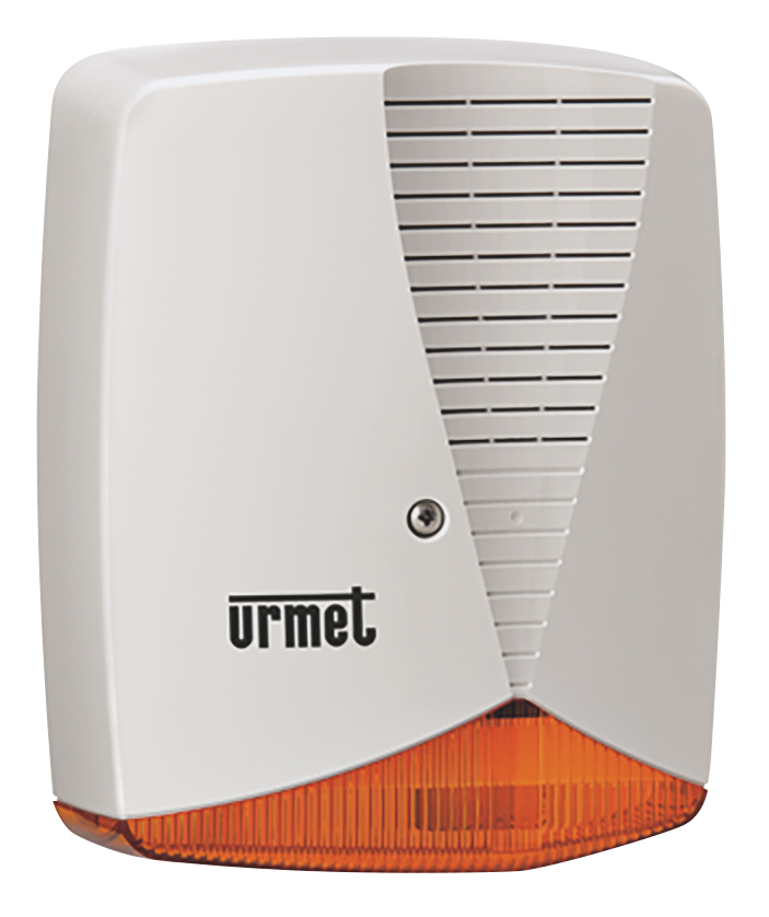 Weißer Alarmgeber mit oranger Blitzleuchte und Lüftungsschlitzen – für den Außeneinsatz zur optischen und akustischen Alarmierung; markiert mit „urmet“-Logo.