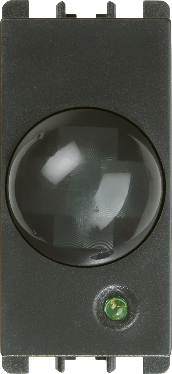 Schwarzer Unterputz-Bewegungsmelder mit großer, gewölbter Linse und grüner LED-Anzeige unten.