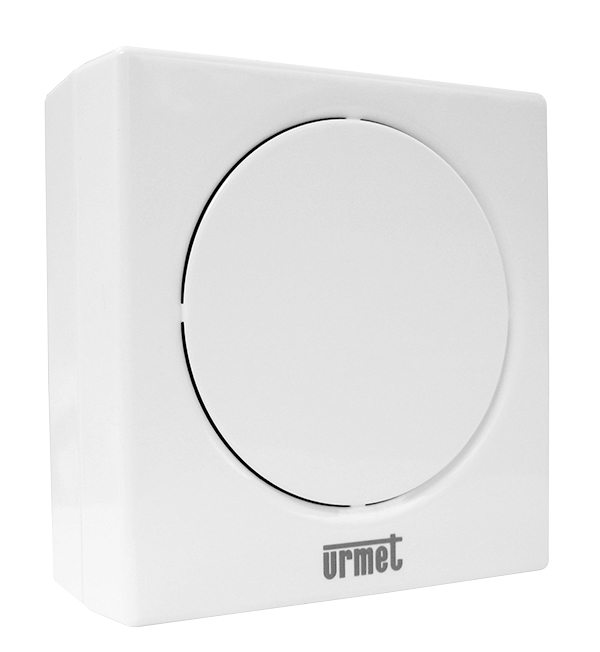 Weißer Zusatzsignalgeber mit kreisförmigem Lautsprecherfeld, Urmet-Logo unten sichtbar, leicht schräge Ansicht.